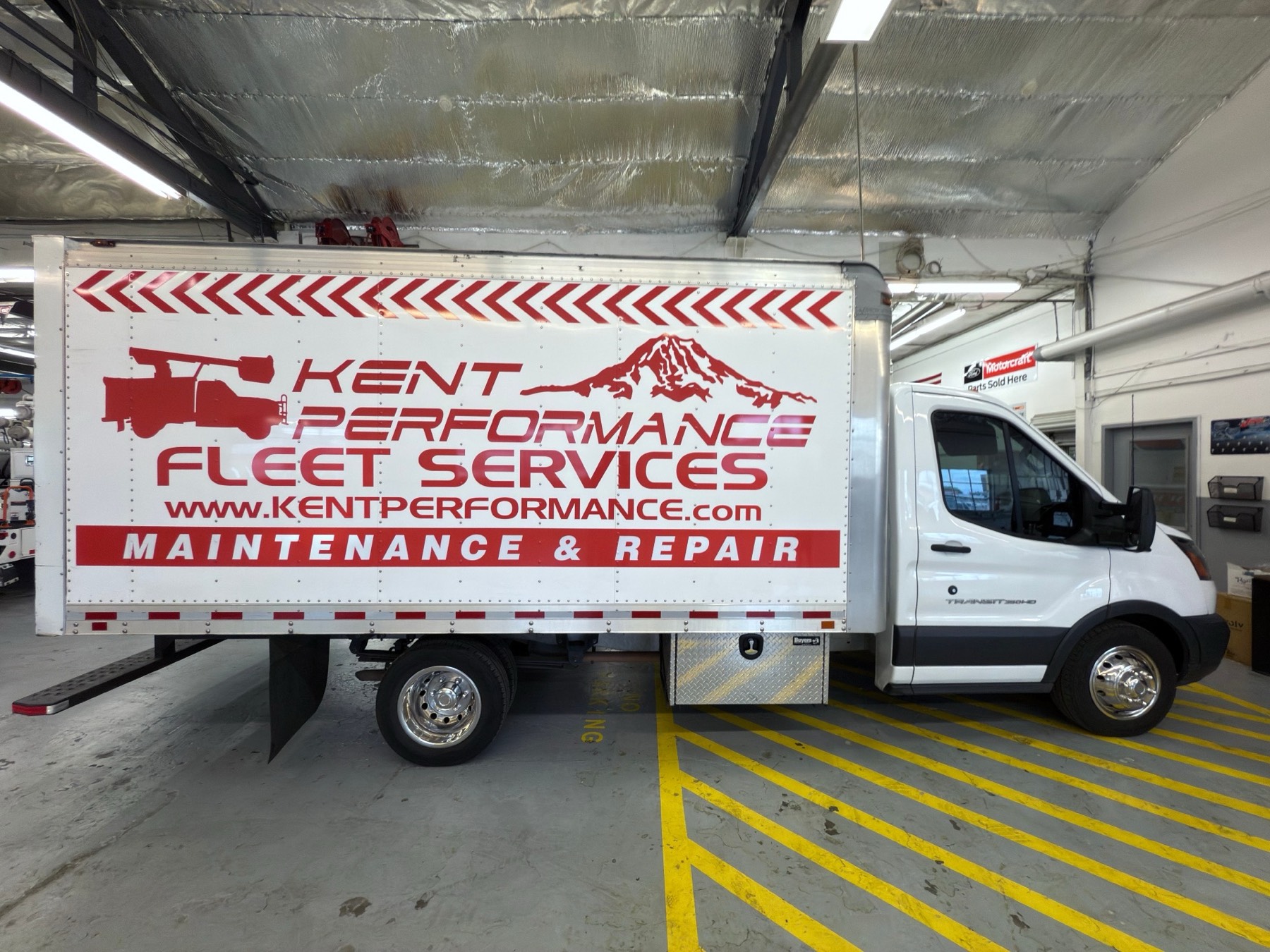 Kent Performance Fleet Services box truck inside the Kent, WA shop